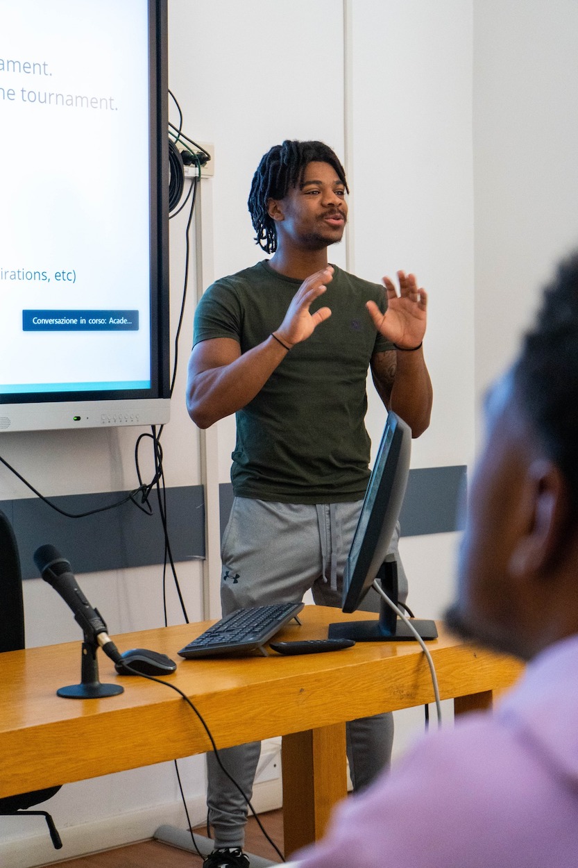 Student presenting during a career workshop at Rome City Institute