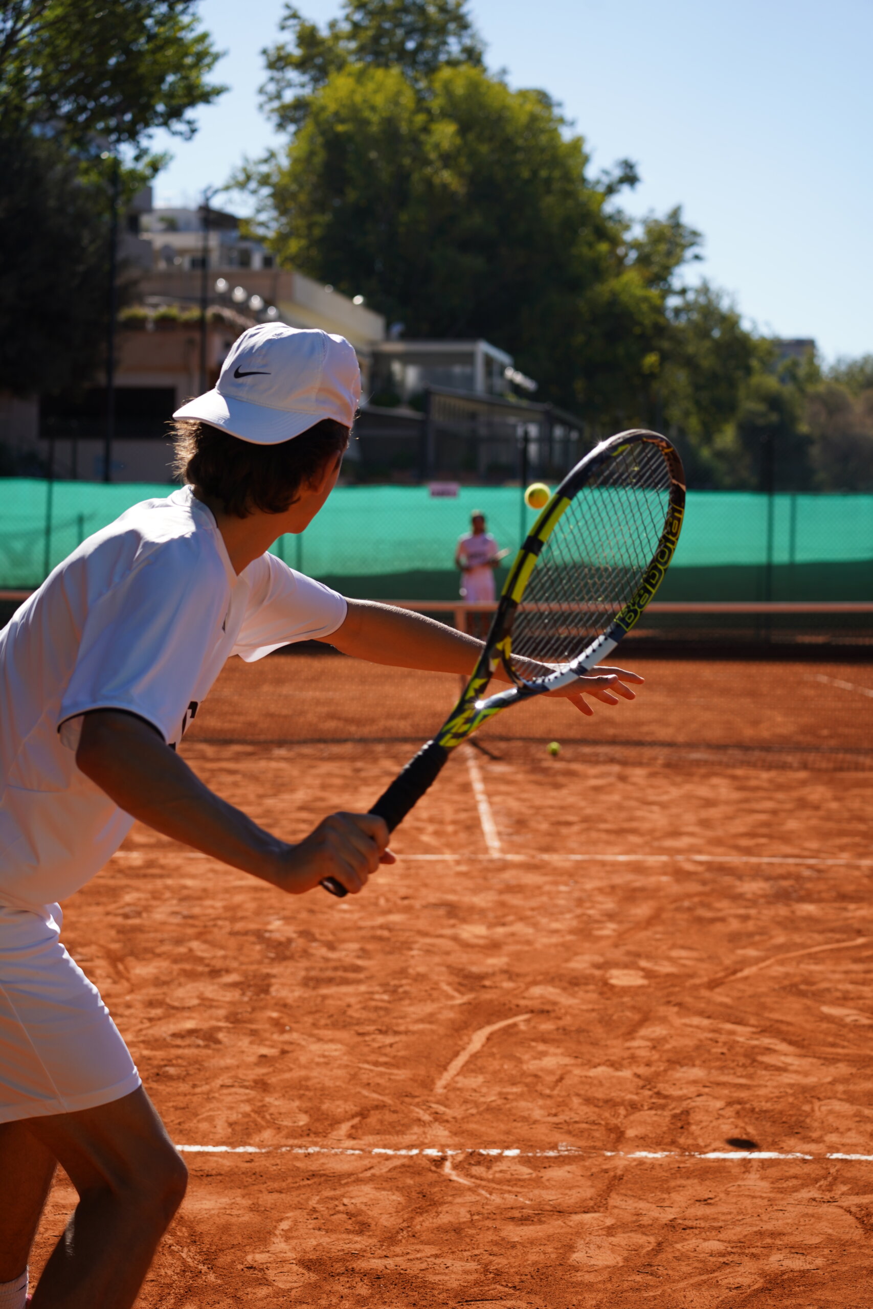 Rome City Institute tennis student-athlete in action