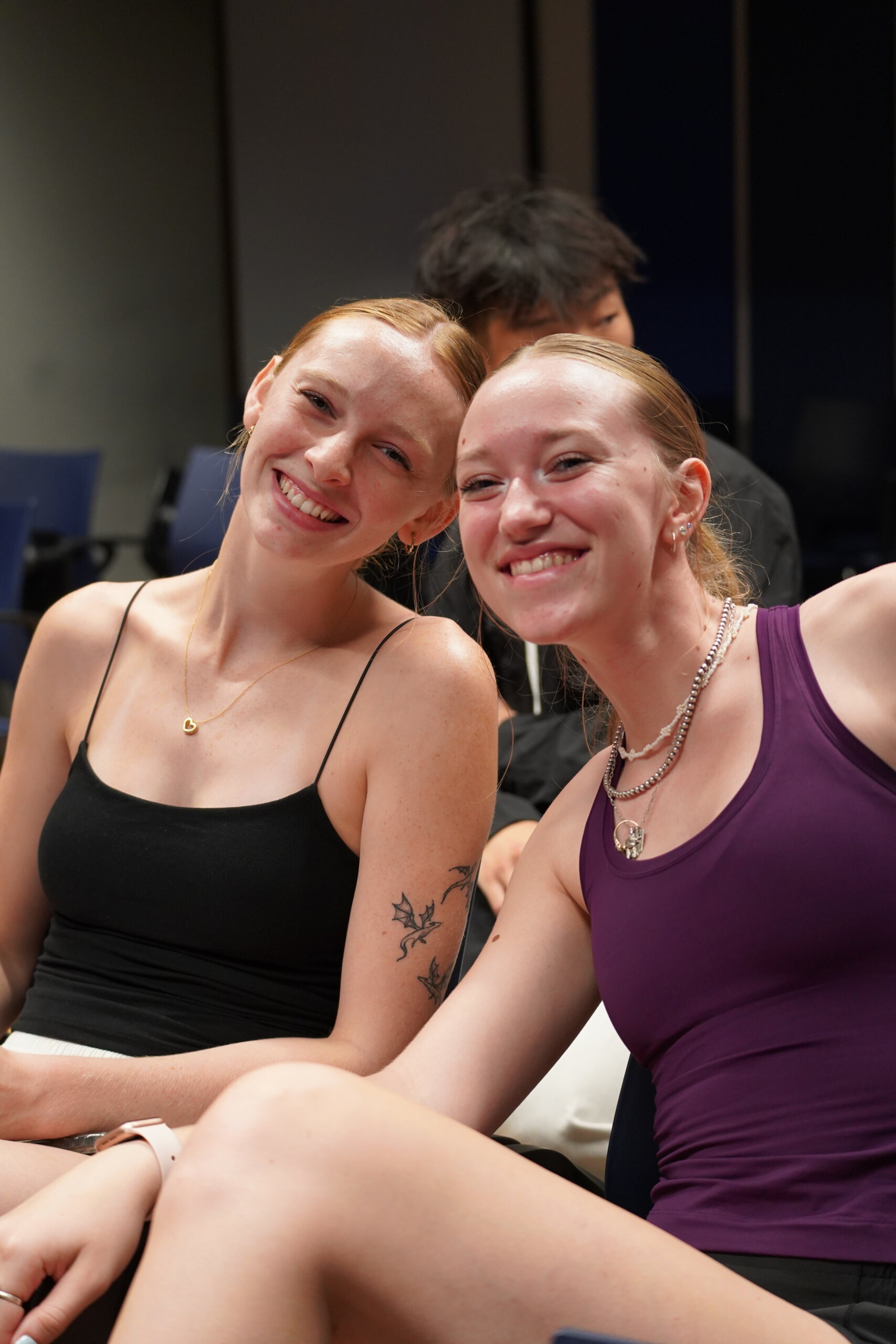 Students laughing together at a campus event