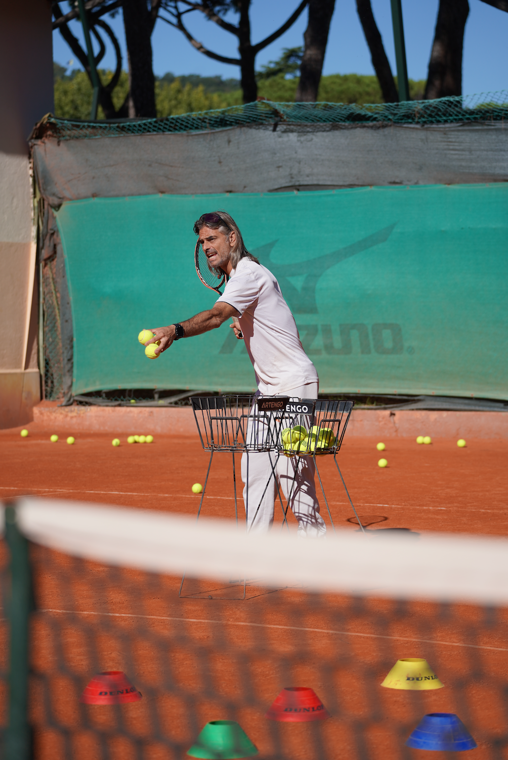 Rome City Institute tennis student-athlete in action