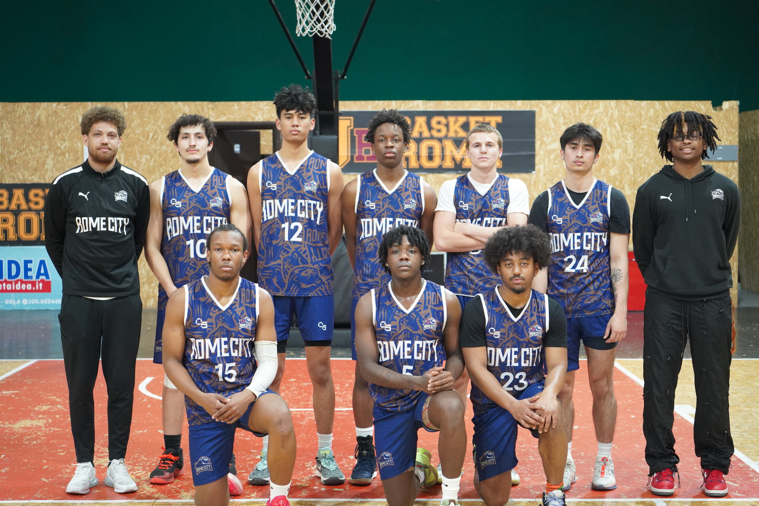 Rome City Institute men's basketball team photo on the court