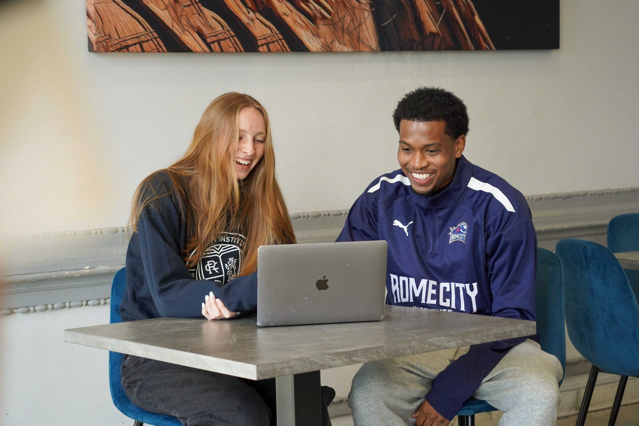 Rome City Institute students working with an academic advisor