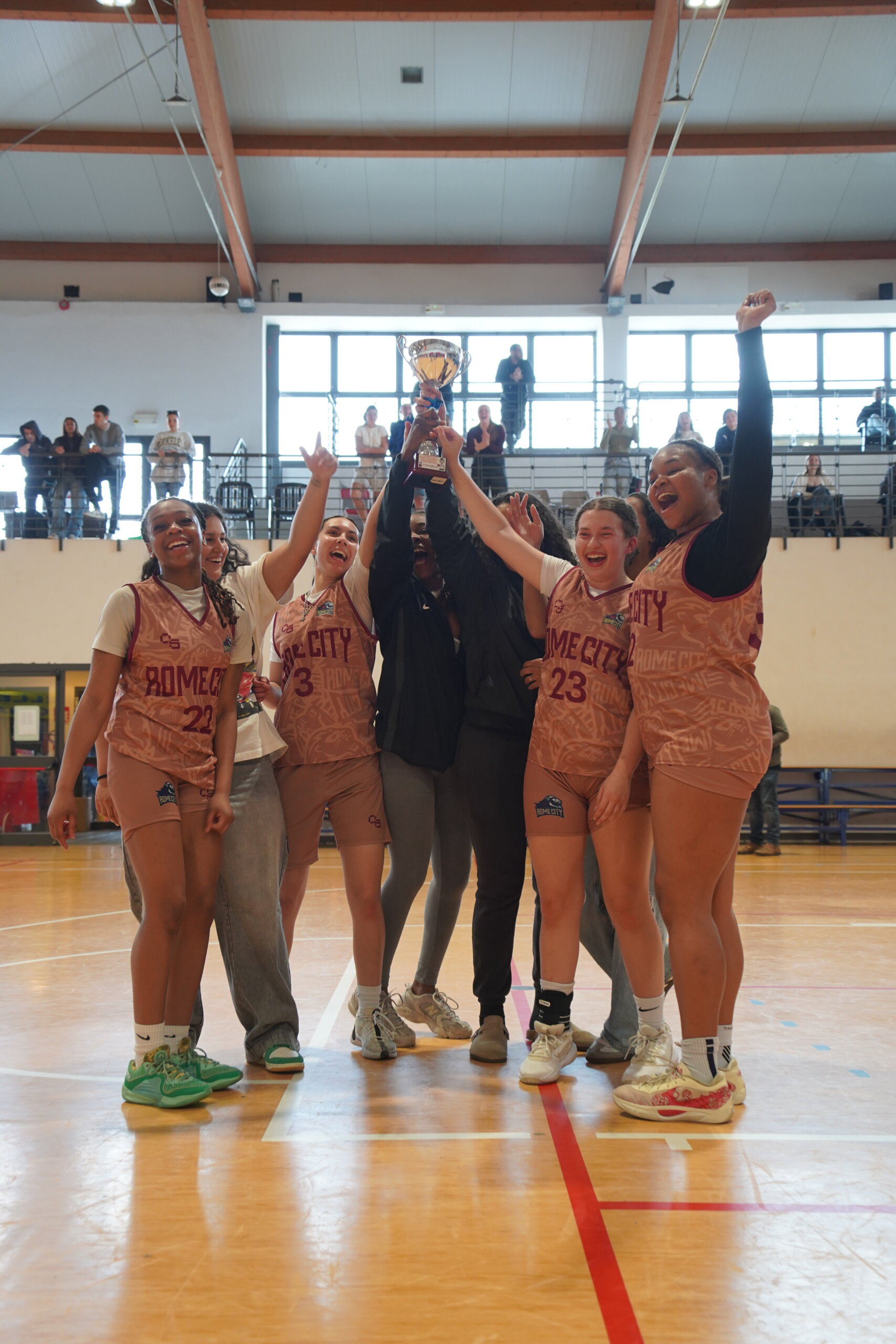Rome City Institute women's basketball team celebrating their 2024/25 University League championship