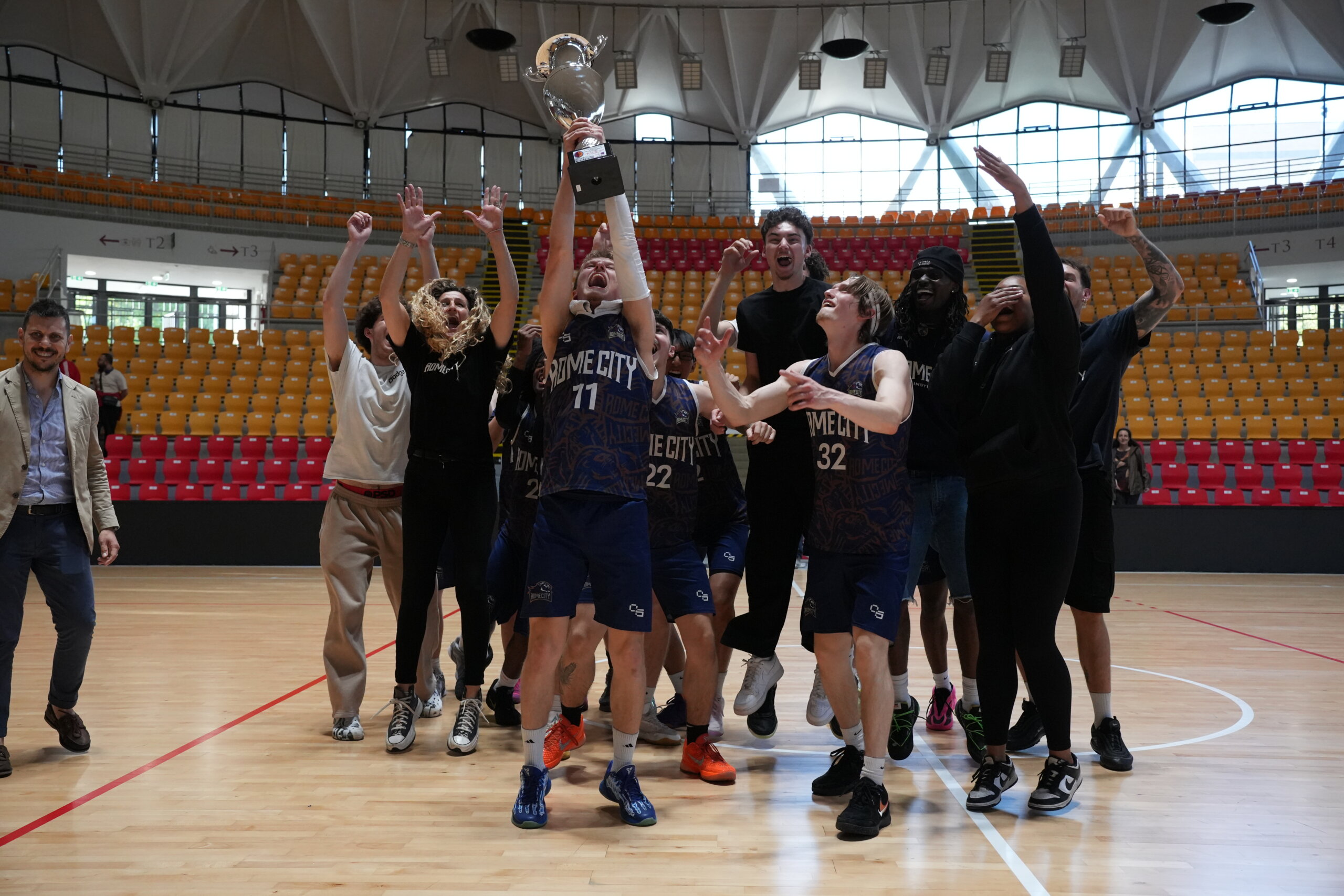 Rome City Institute men's basketball team celebrating their 2025/26 University League championship
