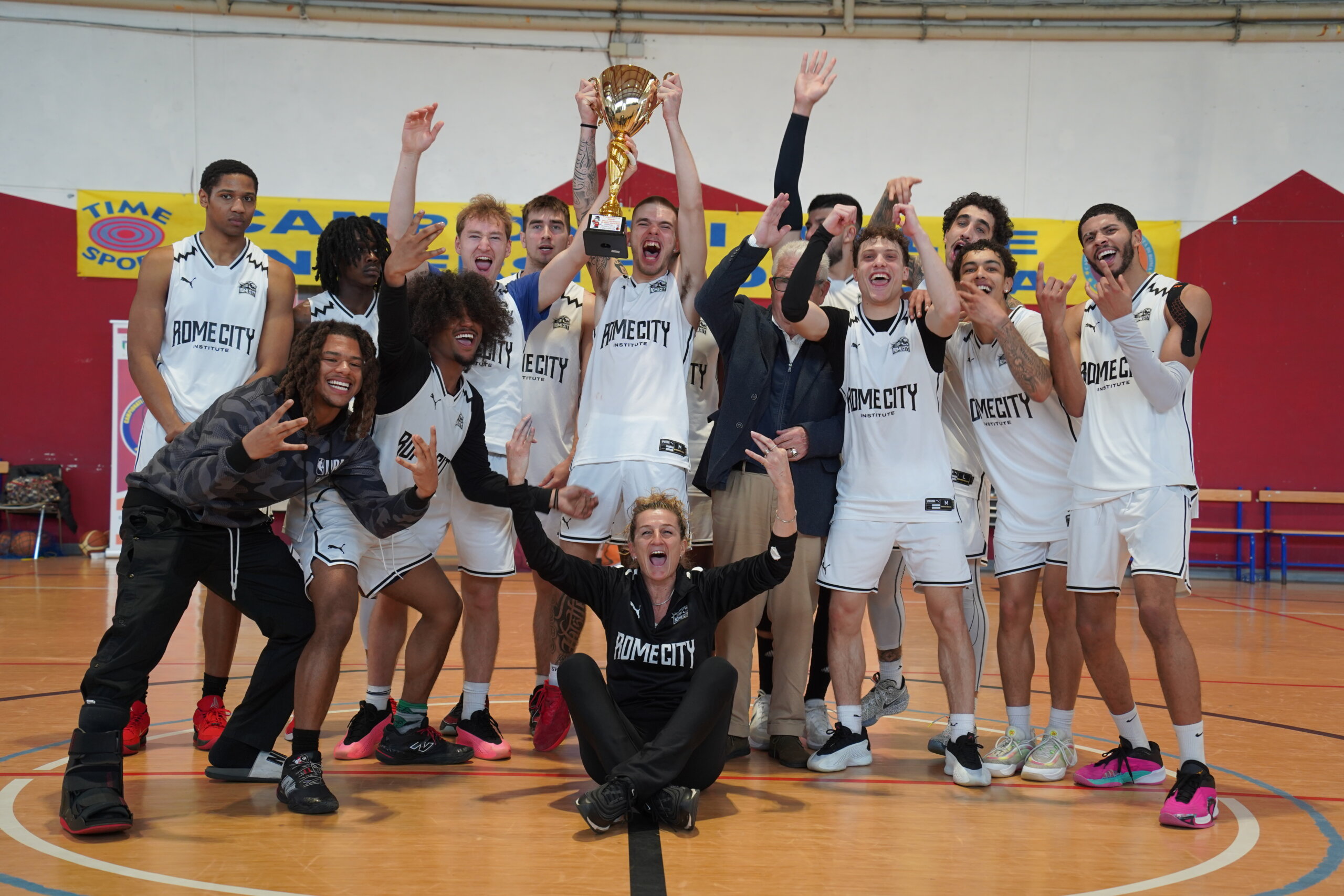 Rome City Institute men's basketball team celebrating their 2024/25 University League championship